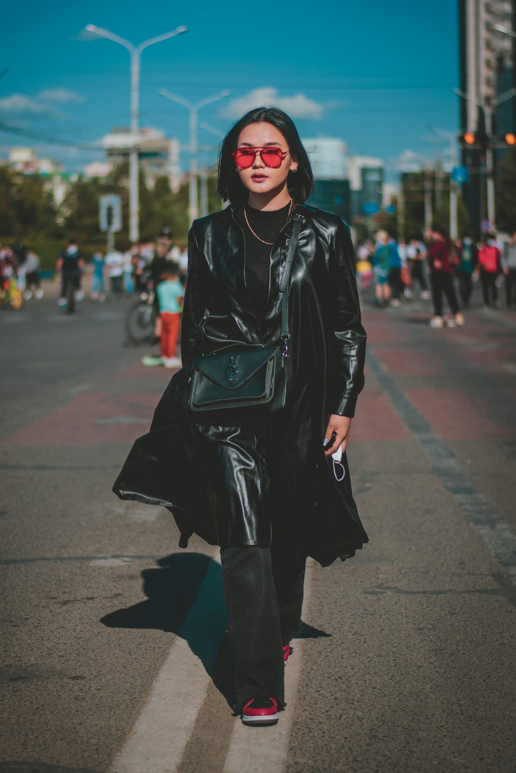 East Asian woman wearing luxury clothes